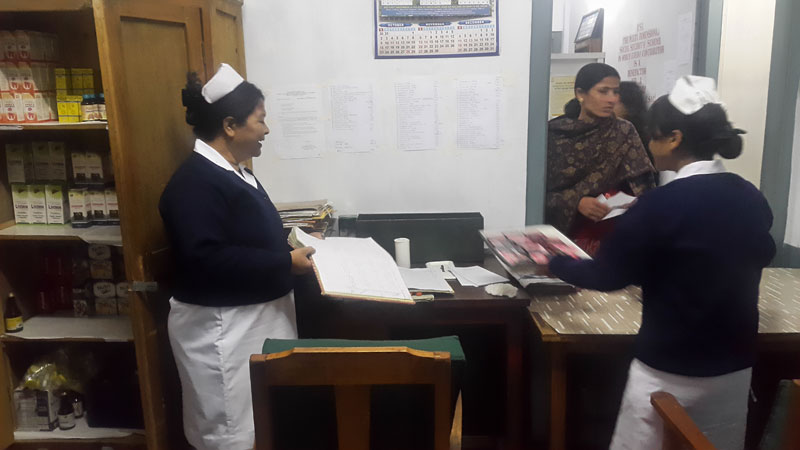 Nurses managing the patient records and medicine pharmacy desk at the ESI Dispensary